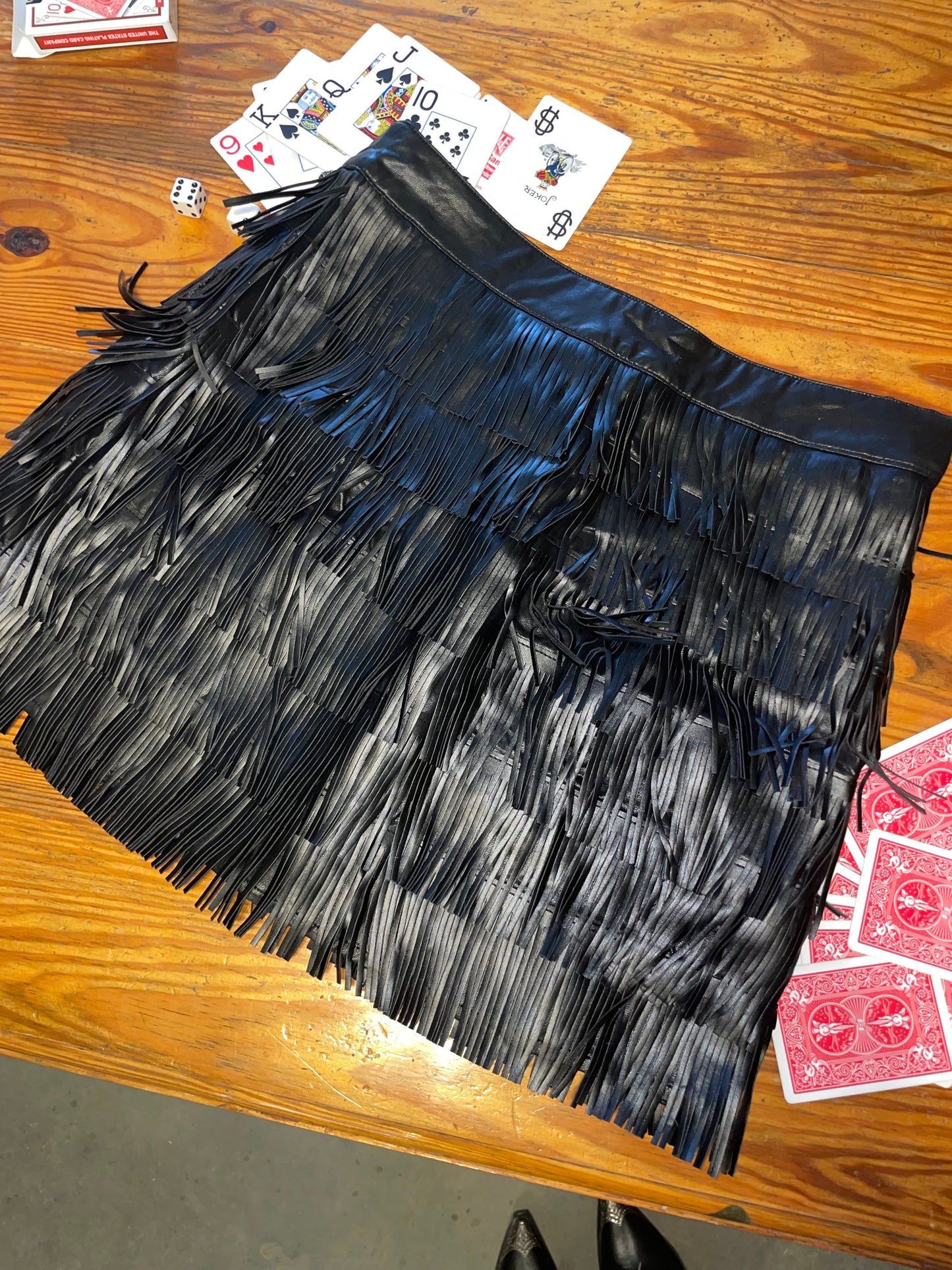 Faux Leather Fringe Mini Skirt in Black